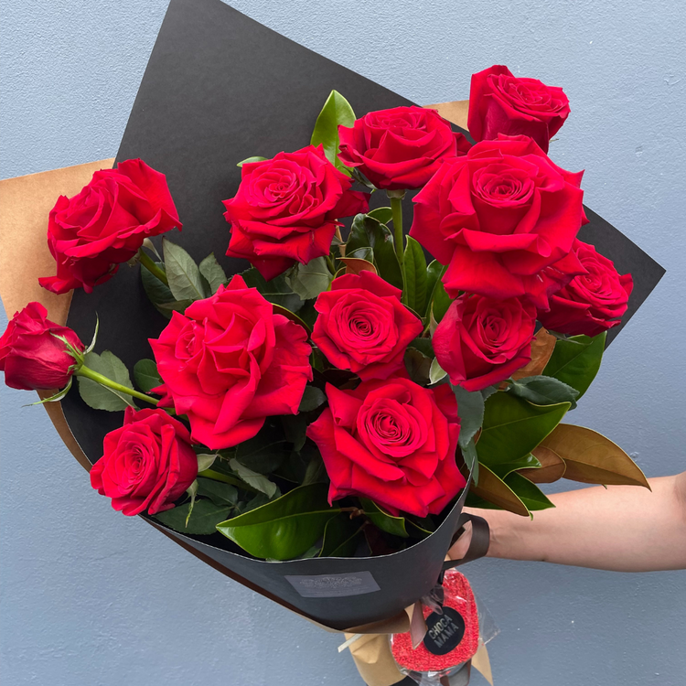 Roses by the dozen. Romance bouquet